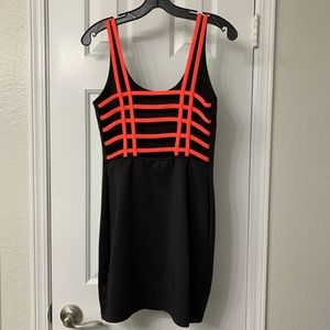 Black cage-back dress, glows under black light